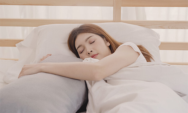 良質の睡眠をとる女性